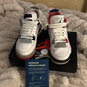 This is a pair of Nike Air Jordan 4 Retro SE "What The" sneakers with box?